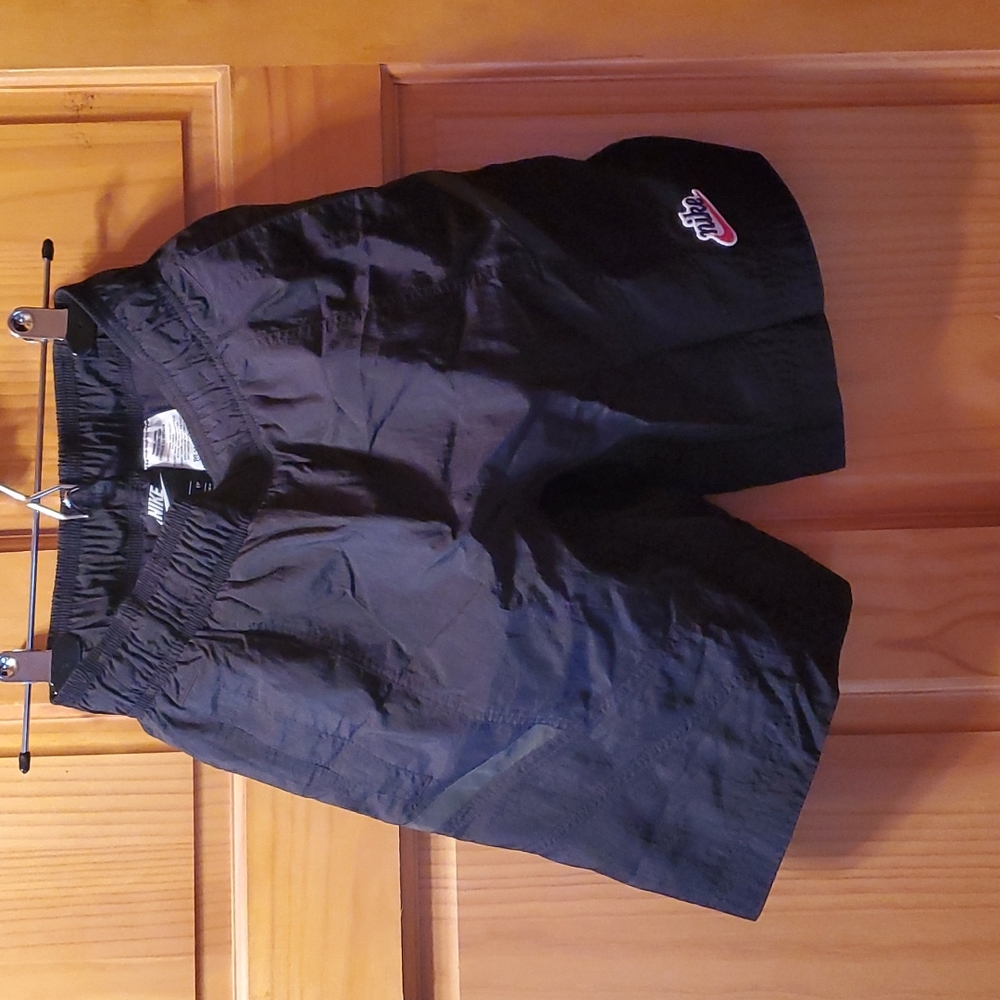 Men's Nike shorts, lined, black, size extra small.